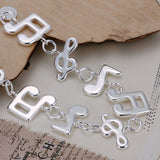 Women's Unisex Sterling Silver Plated  Silver Bracelet Beads Song Notes Good Luck L40