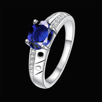 Sterling Silver Plated Birthstone Halo Fashion Ring Blue AAA Zirconia Women B411